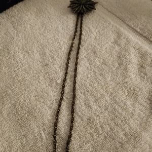 Antique Pin/necklace    Rhinstone Burst Pendant.